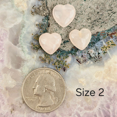 Rose Quartz Crystal Hearts - By Size - size 2 labeled next to quarter for size reference