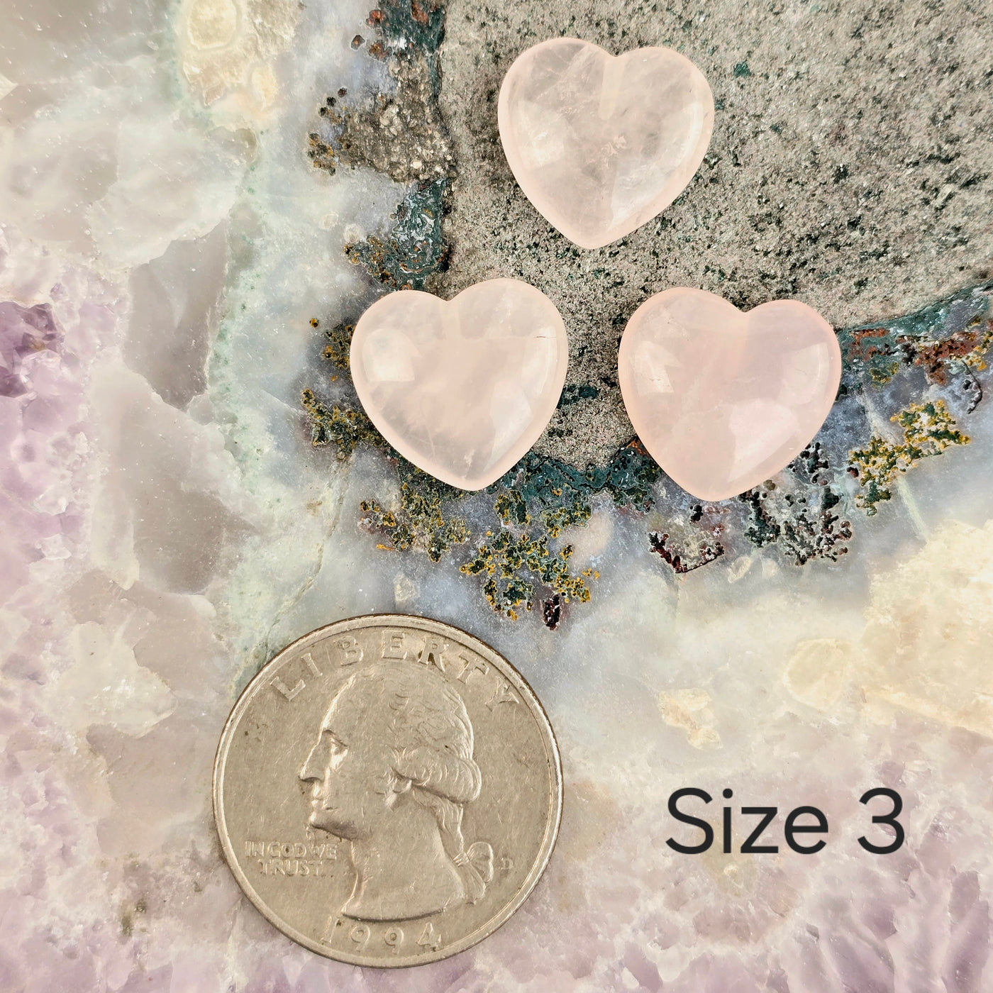 Rose Quartz Crystal Hearts - By Size - size 3 by quarter for size reference