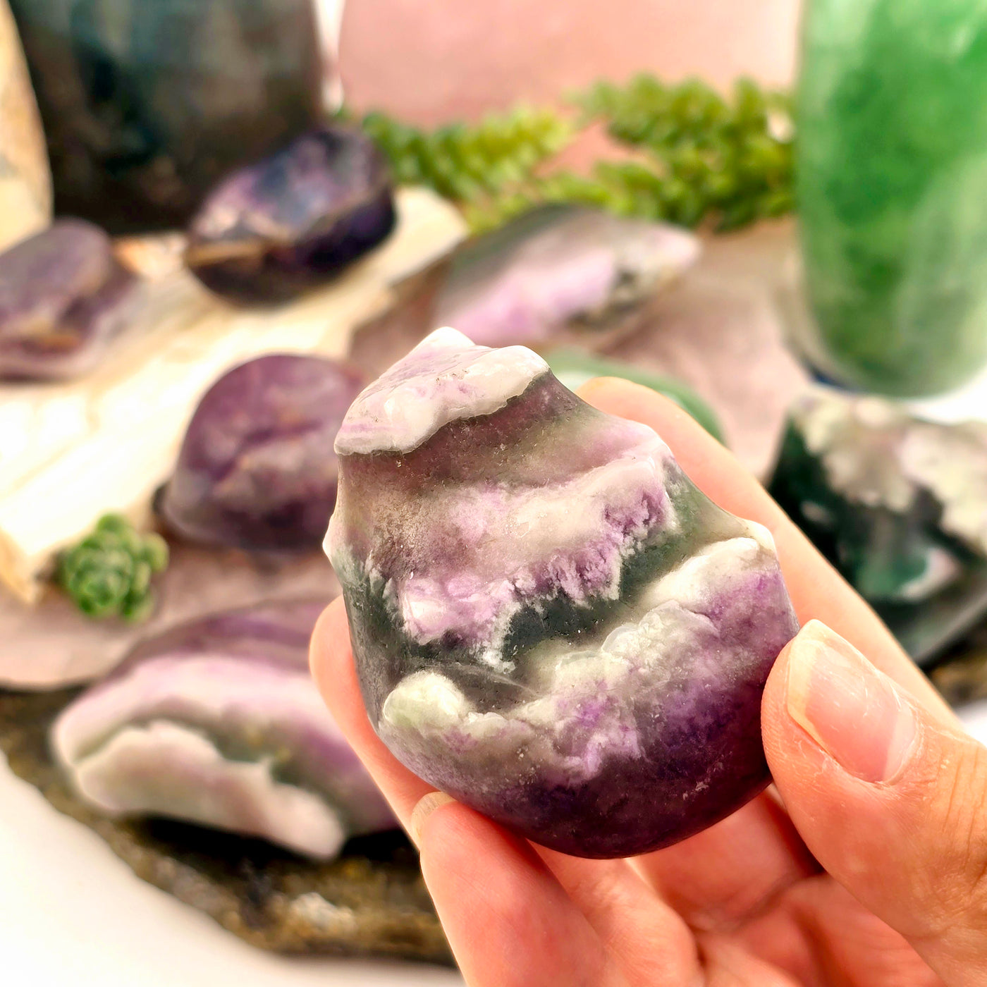 Rainbow Fluorite - Large Tumbled Stones - You Choose variant 7 in hand for size reference with other variants in the background