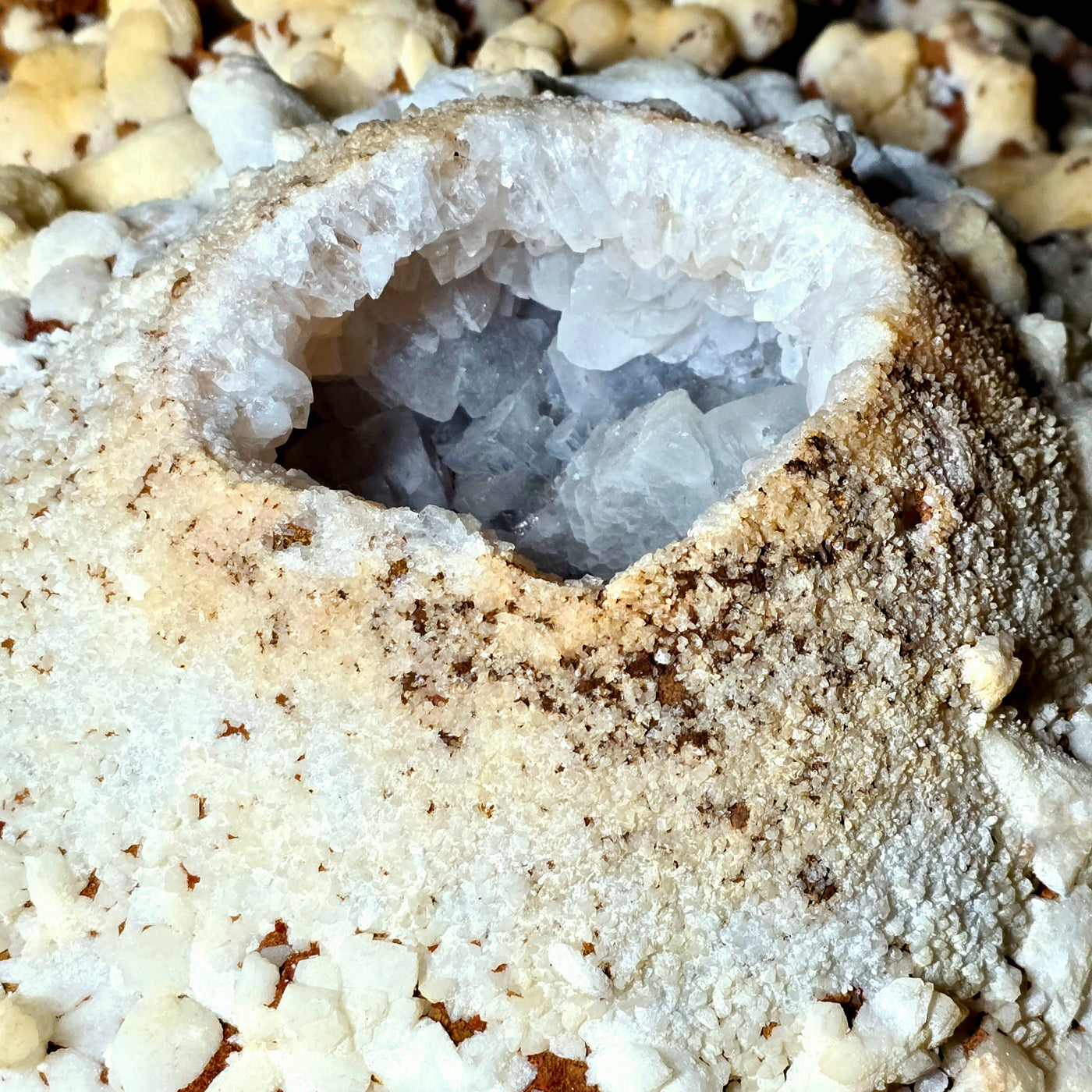 High-Grade Pink Amethyst Crystal Geode on Rotating Stand closeup to show detail of geode center