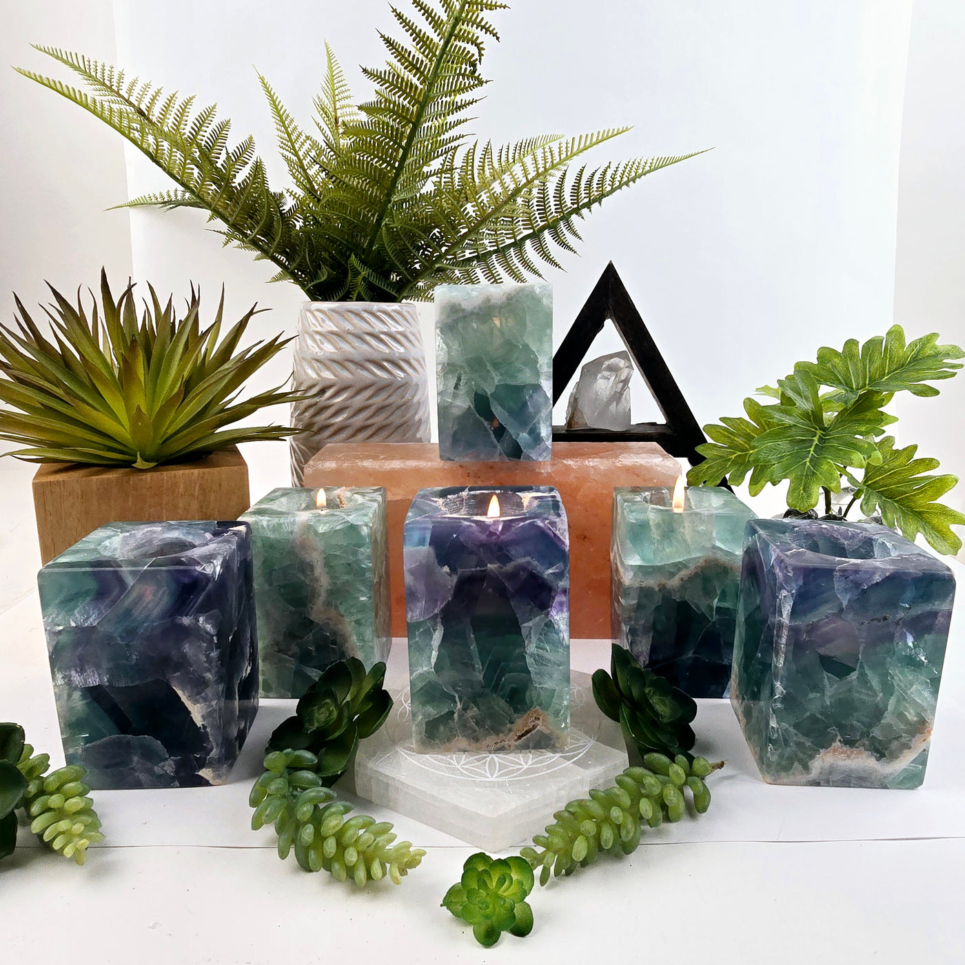 Fluorite Crystal Candle Holder - AA Grade candles lit with bright background