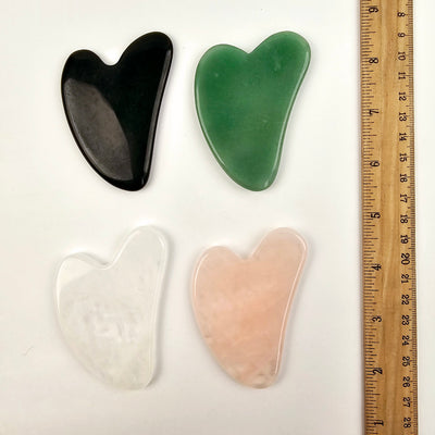 Stone Gua Sha Face Massage Tool - all variants with ruler for size reference