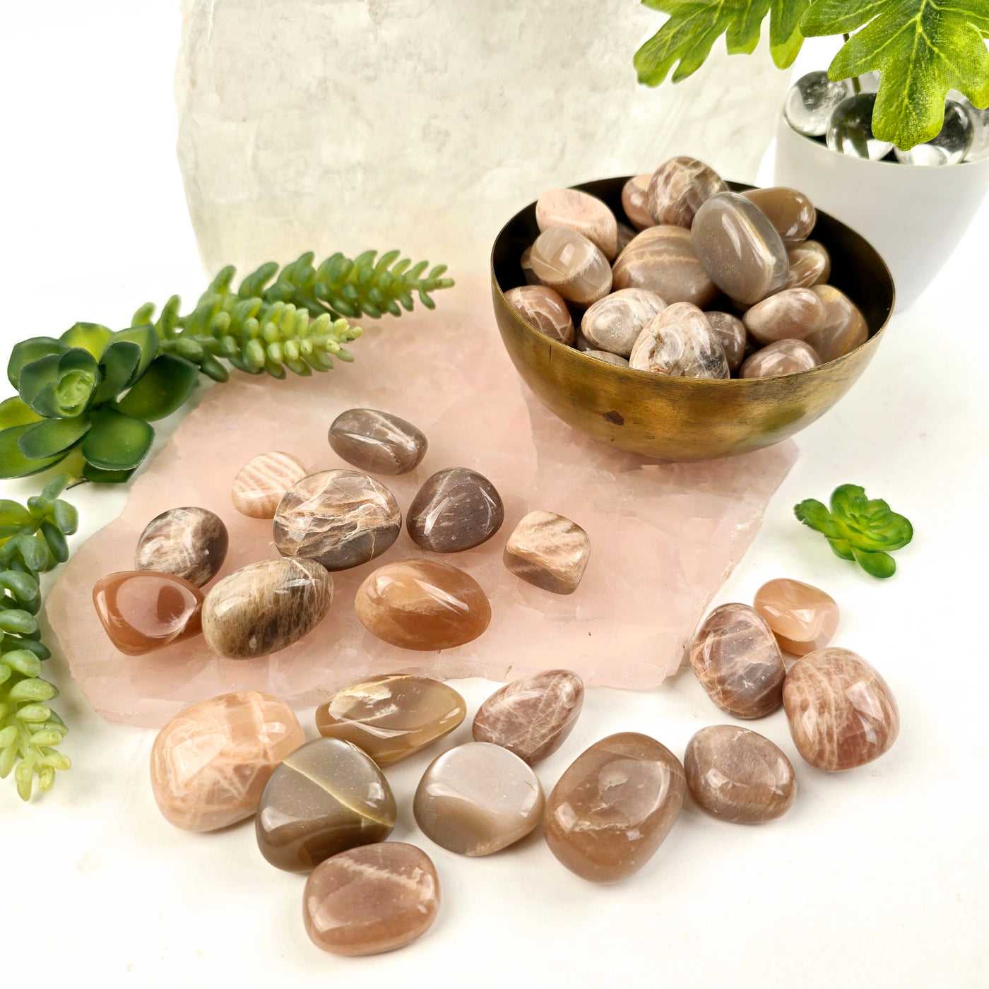 Peach Moonstone Tumbled Stones - Medium Size - 1/2 lb or 1 lb some on platter some in bowl with plants and props in the background