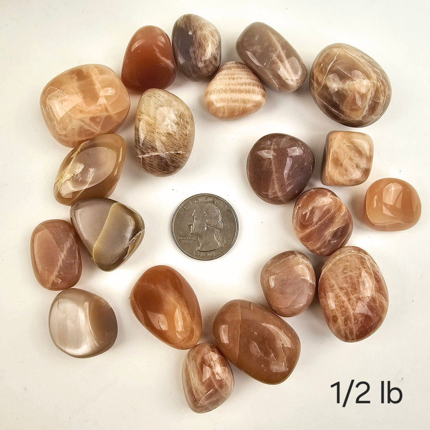 Peach Moonstone Tumbled Stones - Medium Size - 1/2 lb variant labeled with quarter for size reference