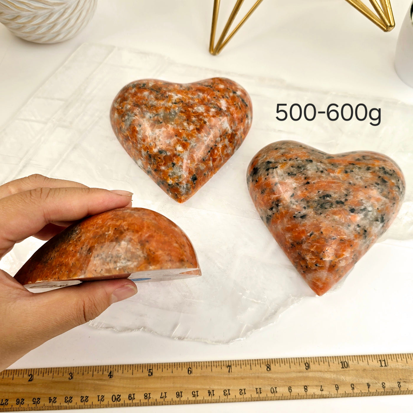 Large Orchid Calcite Polished Heart - By Weight 500-600g labeled with hand and ruler for size reference