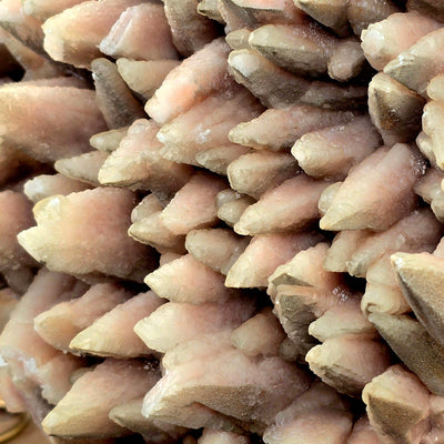 Pink Calcite Crystal Cluster with Wooden Stand closeup for detail