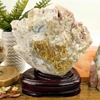 Pink Calcite Crystal Cluster with Wooden Stand back view