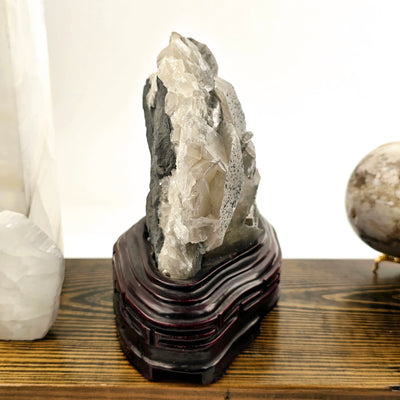 Calcite and Stibnite Crystal Cluster with Wooden Stand side view