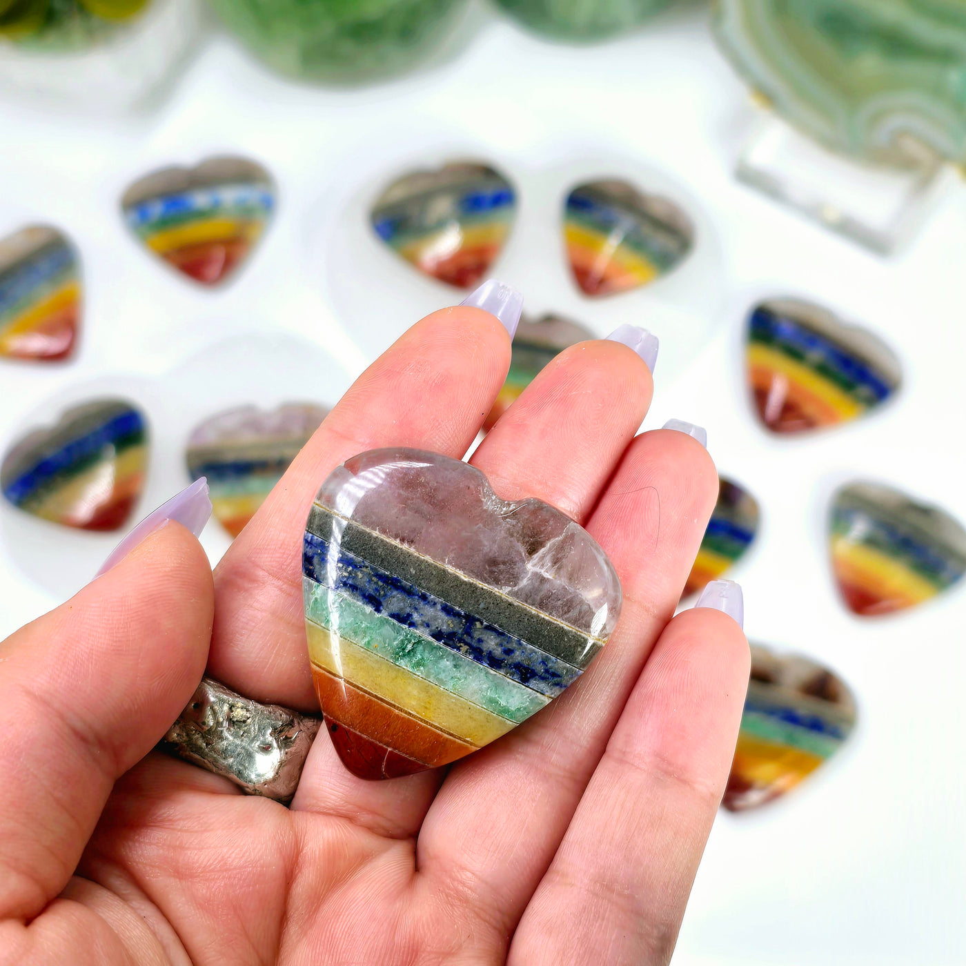 Seven Chakra Crystal Heart - Rainbow Gemstone Heart - You Choose one in hand for size reference with others in background