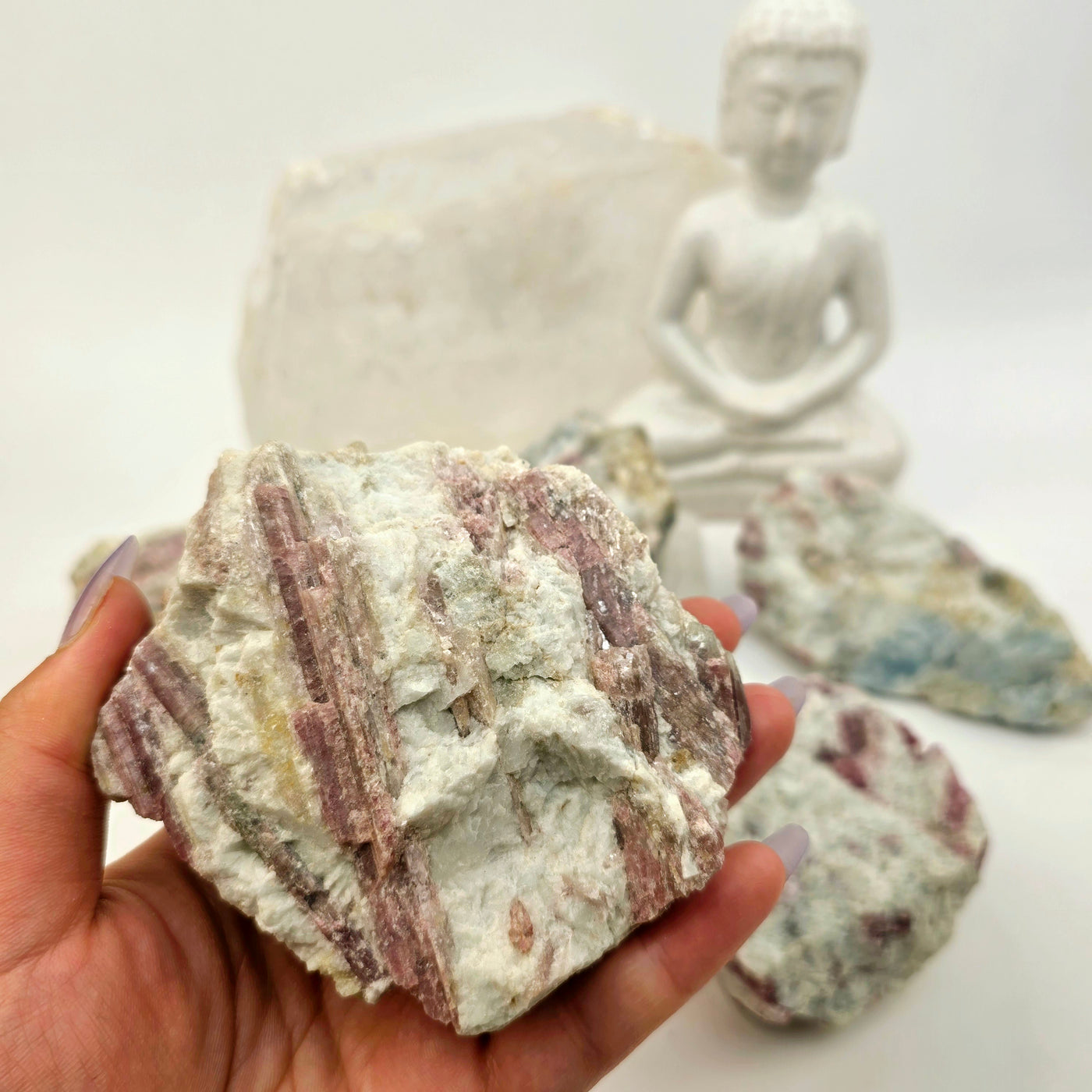 Pink Tourmaline Crystals on Aquamarine Matrix - You Choose #2 - variant E in hand for size reference with other variants in the background with props