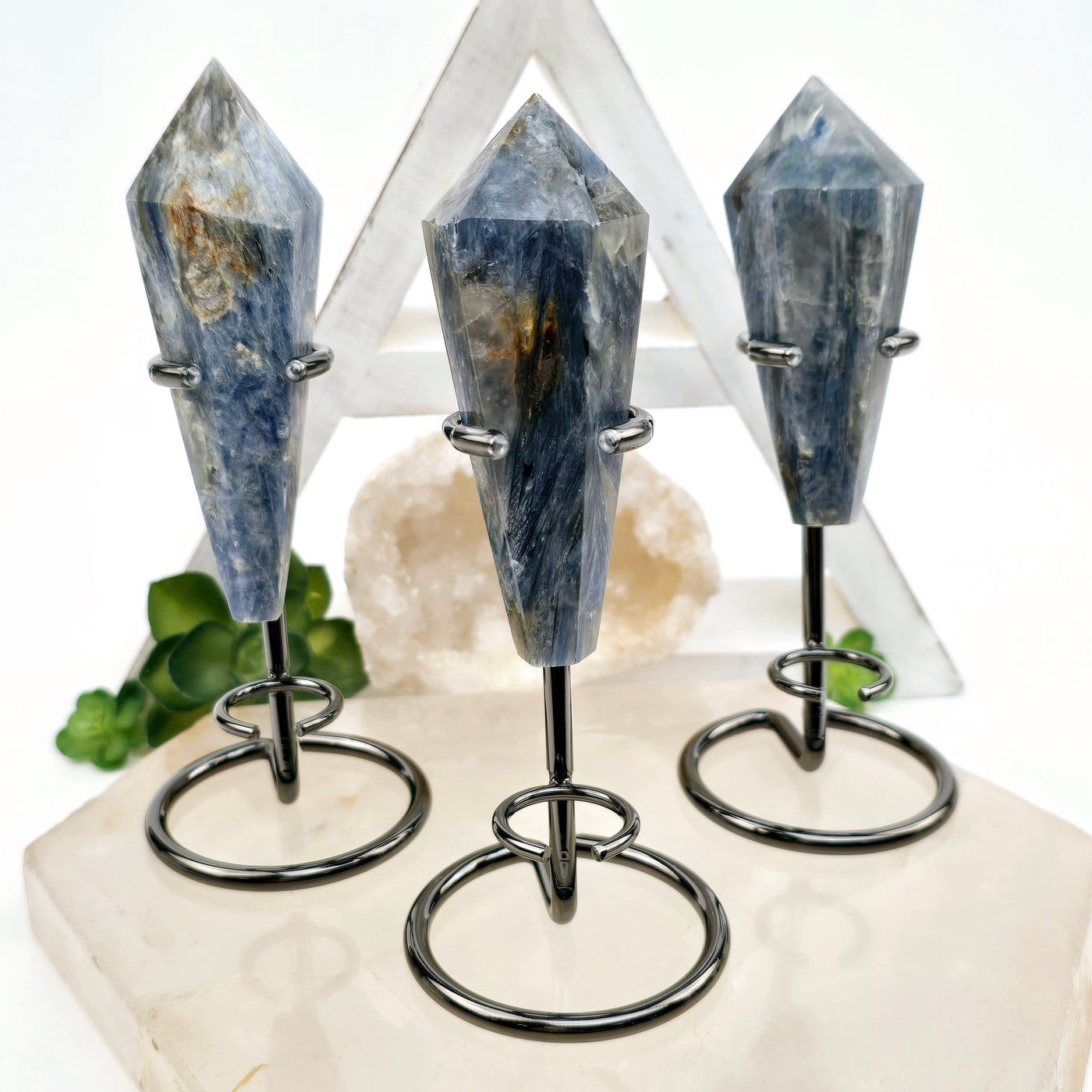 Blue Kyanite - Small Crystal Wand on Stand - You Choose - all variants on stone platter with props and plants in the background