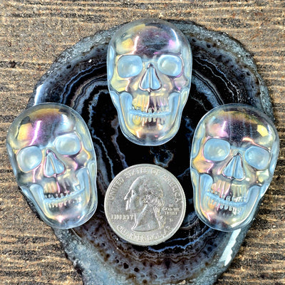 Angel Aura Crystal Quartz Skull Cabochon with quarter for size reference