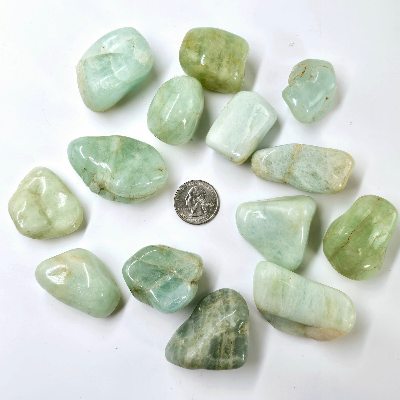 Aquamarine Large Tumbled Stone - By the Piece with quarter for size reference