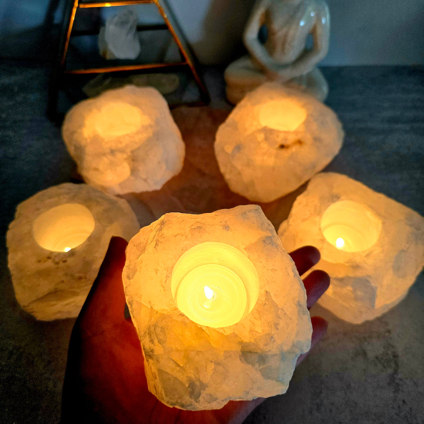 Crystal Quartz Candle Holder "B" Quality, in a hand for size reference
