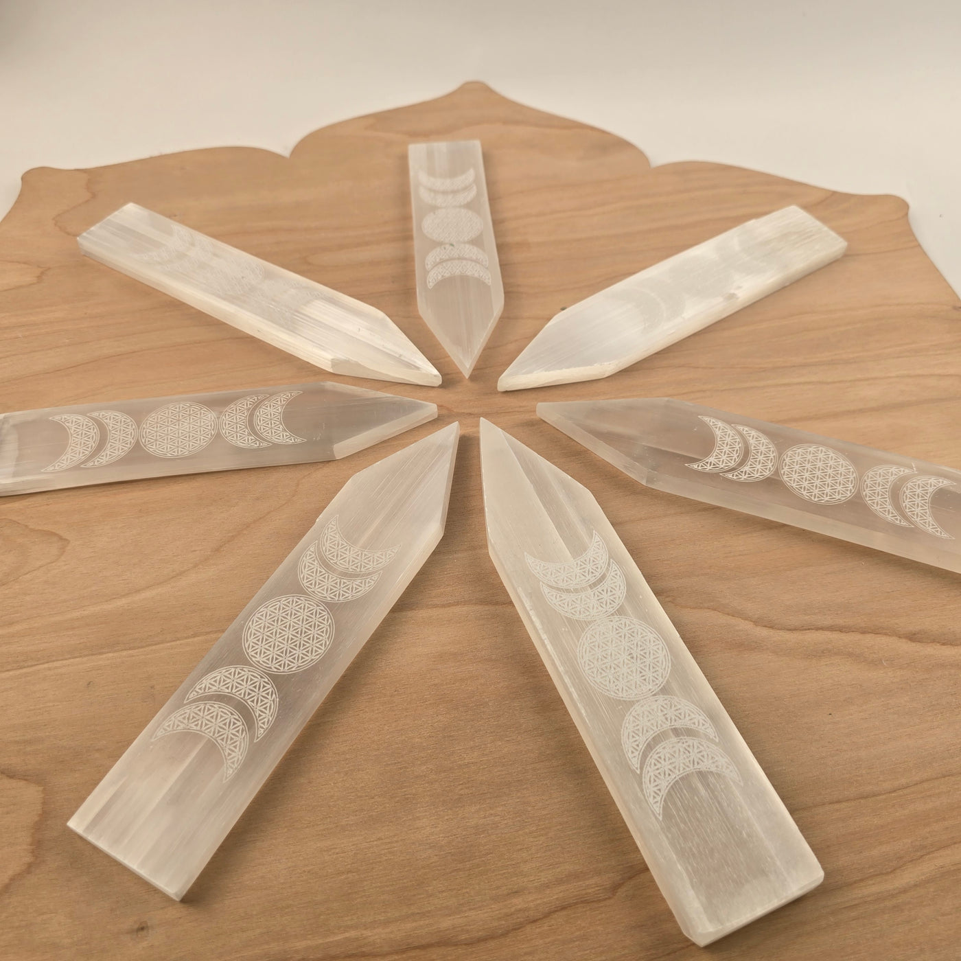 Selenite Charging Plate Engraved with Flower of Life Moon Phase Design -  8" Pointed Stick side view without crystals to show Flower of Life Moon Phase design