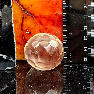 Crystal Quartz Round Faceted Sphere - You Choose variant A labeled with ruler for size reference