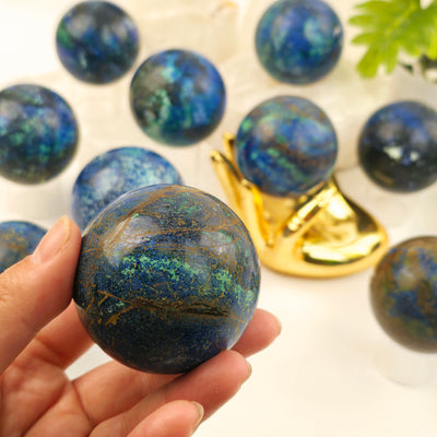 Azurite with Malachite Crystal Sphere - You Choose - one variant in hand for size reference with other variants in the background