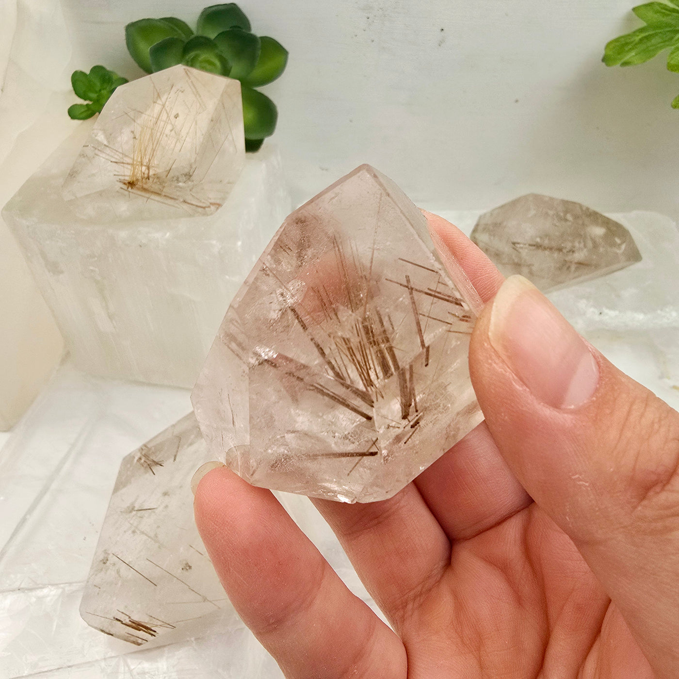 Rutilated Quartz - Polished Freeform Crystal - YOU CHOOSE #2 - variant 4 in hand for size reference with other variants in the background