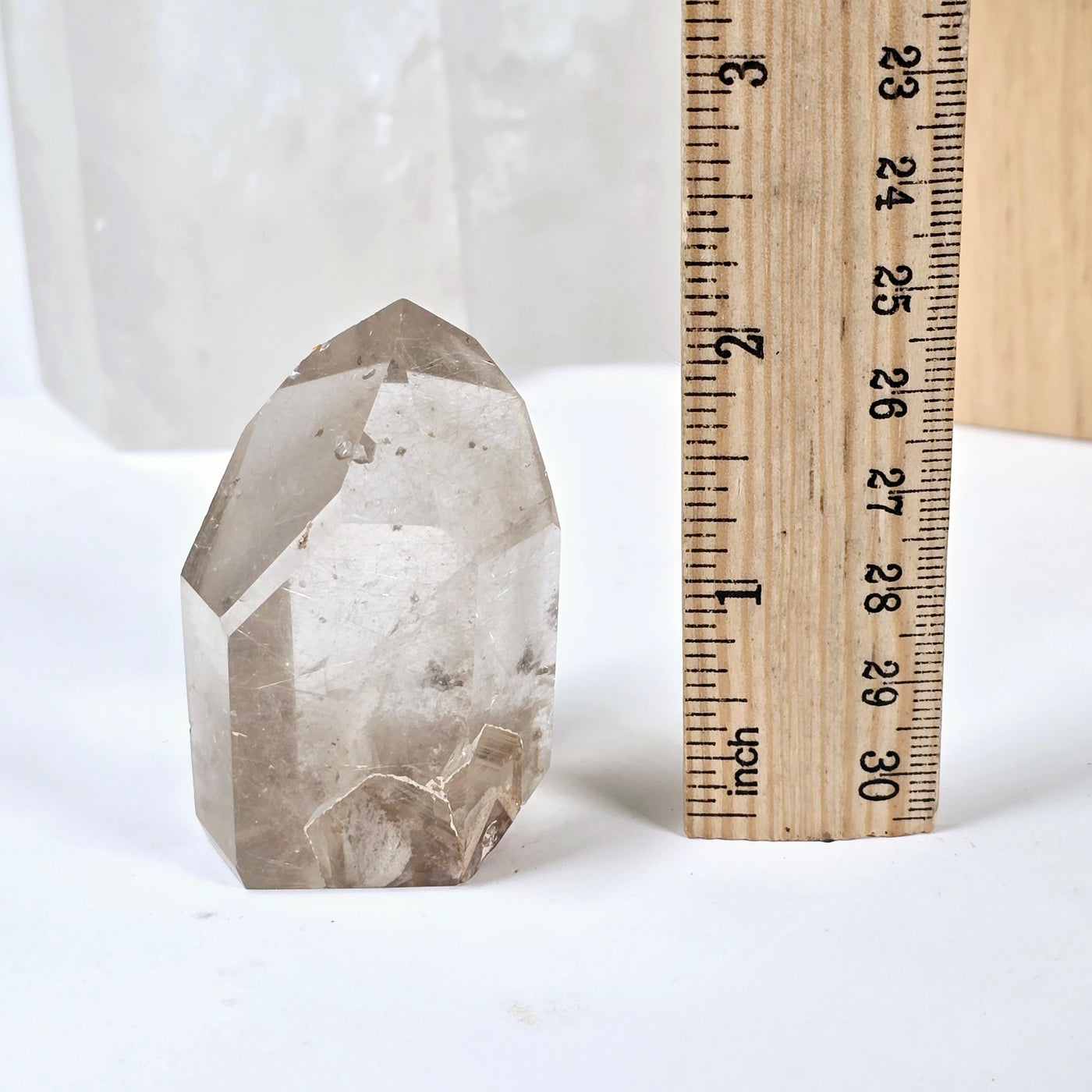 Rutilated Quartz Crystal Point with Phantoms - One-of-a-Kind front view with ruler for size reference