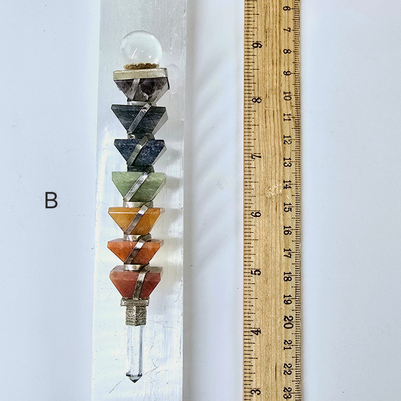 Seven Chakra Crystal Pyramid Wand - You Choose variant B labeled on selenite bar with ruler for size reference