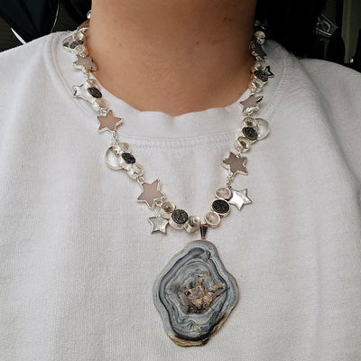 Chalcedony Druzy Galaxy Pendant Sterling Silver Necklace with Druzy and Mother-of-Pearl Stars and Crystal Quartz Moon Charms - Handmade - One-of-a-Kind being worn for size reference