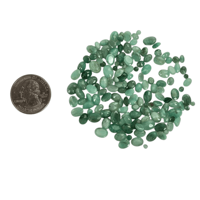 Emerald - 100 Carats Loose Faceted Gemstones - 2mm-6mm Assorted Sizes and Shapes - You Get All in circular pile next to quarter for size reference