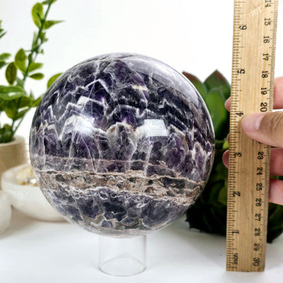 Chevron Amethyst Crystal Sphere One-of-a-Kind #1 front view with ruler in hand for size reference