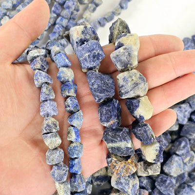 Rough Sodalite Crystal Beads - Full Strand - You Choose Size both sizes in hand for size reference with strands in the background