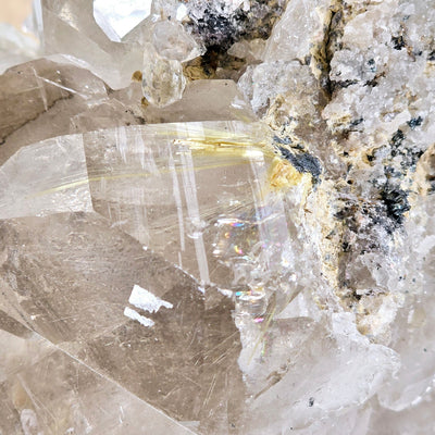 Rutilated Natural Smokey Citrine Crystal Cluster on Rotating Stand closeup for detail