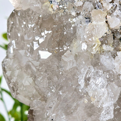 Rutilated Natural Smokey Citrine Crystal Cluster on Rotating Stand closeup for detail