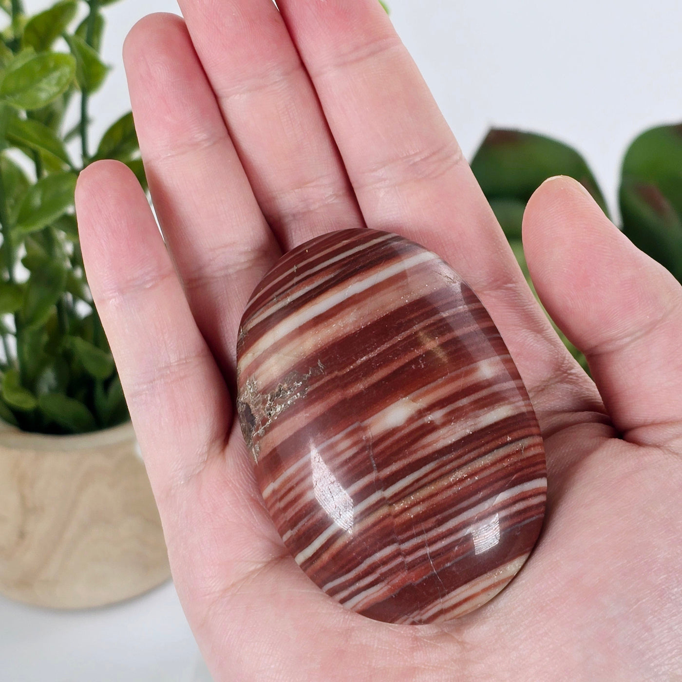 Banded Red Jasper Palm Stone - One-of-a-Kind in hand for size reference