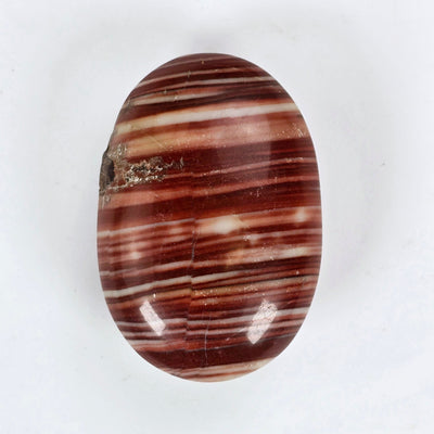 Banded Red Jasper Palm Stone - One-of-a-Kind on white background front view