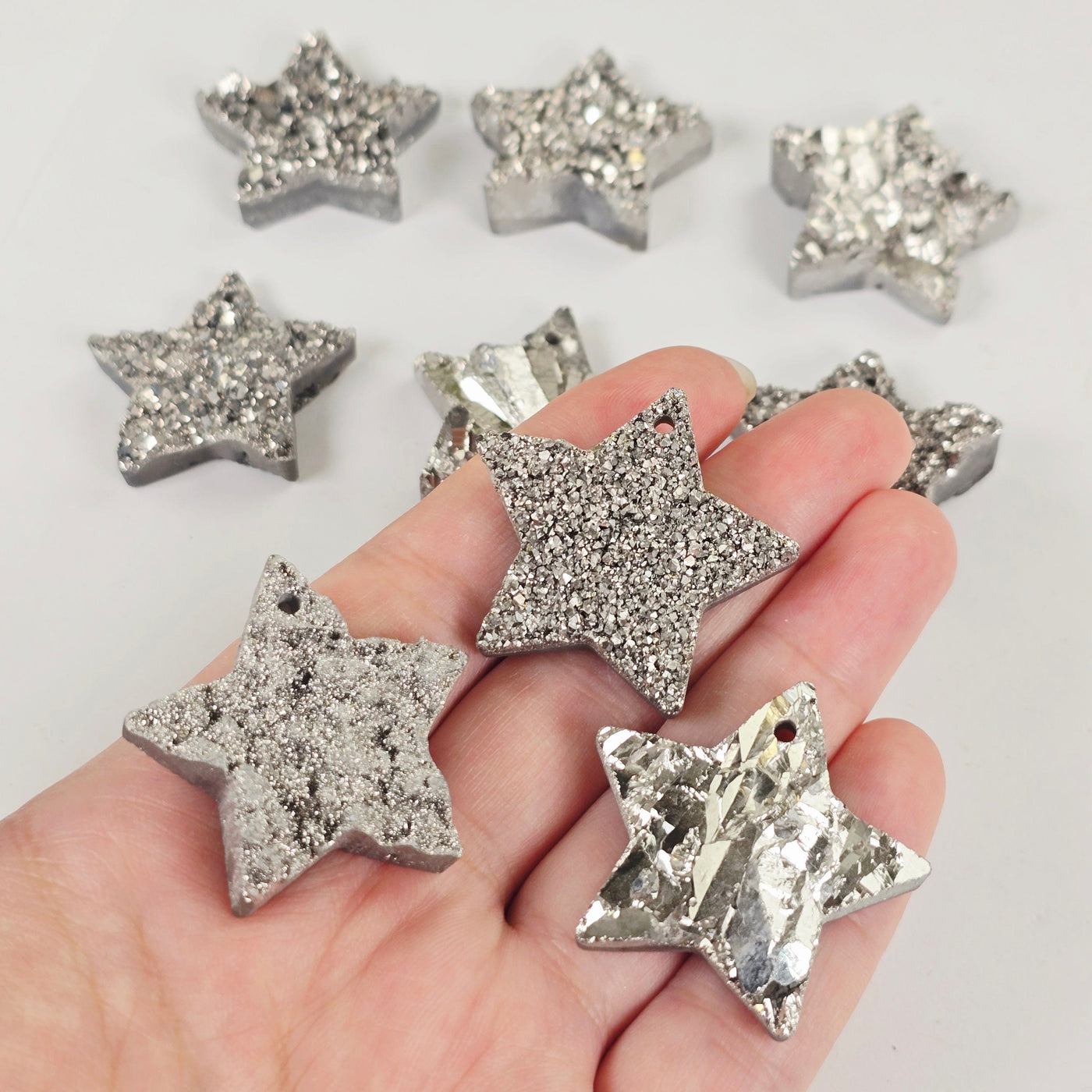 Mystic Silver Titanium Coated Druzy Crystal Star Pendants - Top Front Drilled three in hand for size reference with others in background