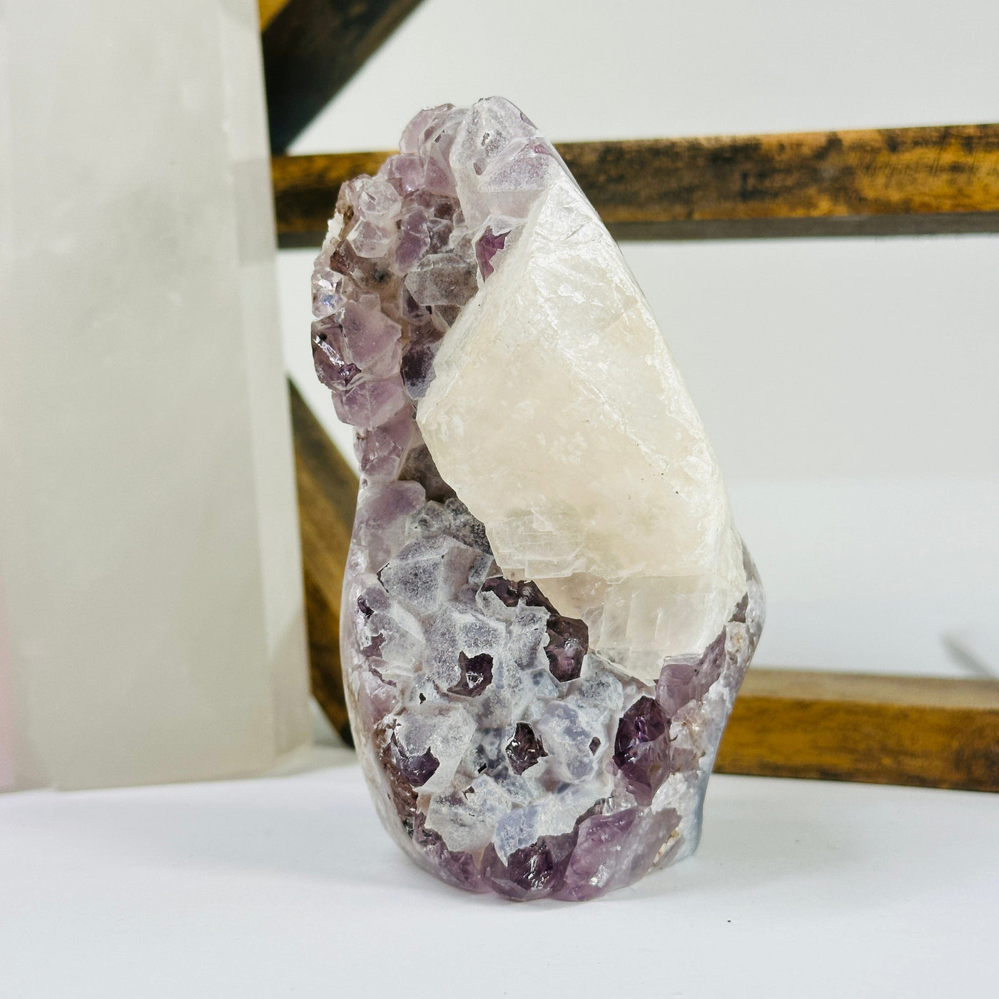 amethyst cut base with decorations in the background