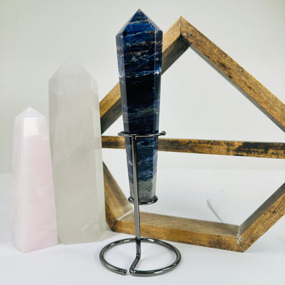 sodalite on stand with decorations in the background