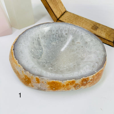 agate bowl with decorations in the background