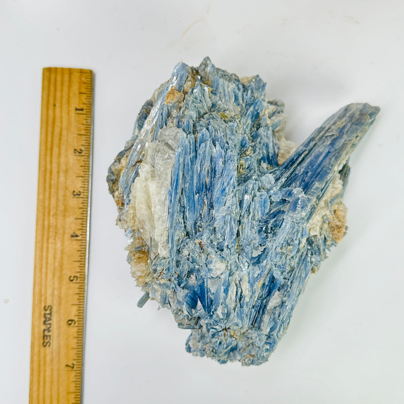 kyanite next to a ruler for size reference