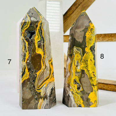 BUMBLEBEE JASPER POINTS WITH DECORATIONS IN THE BACKGROUND