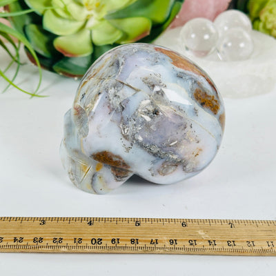 Pink Opal Crystal Skull with ruler for size reference