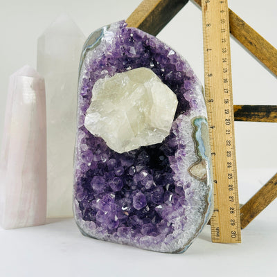 amethyst cut base next to a ruler for size reference