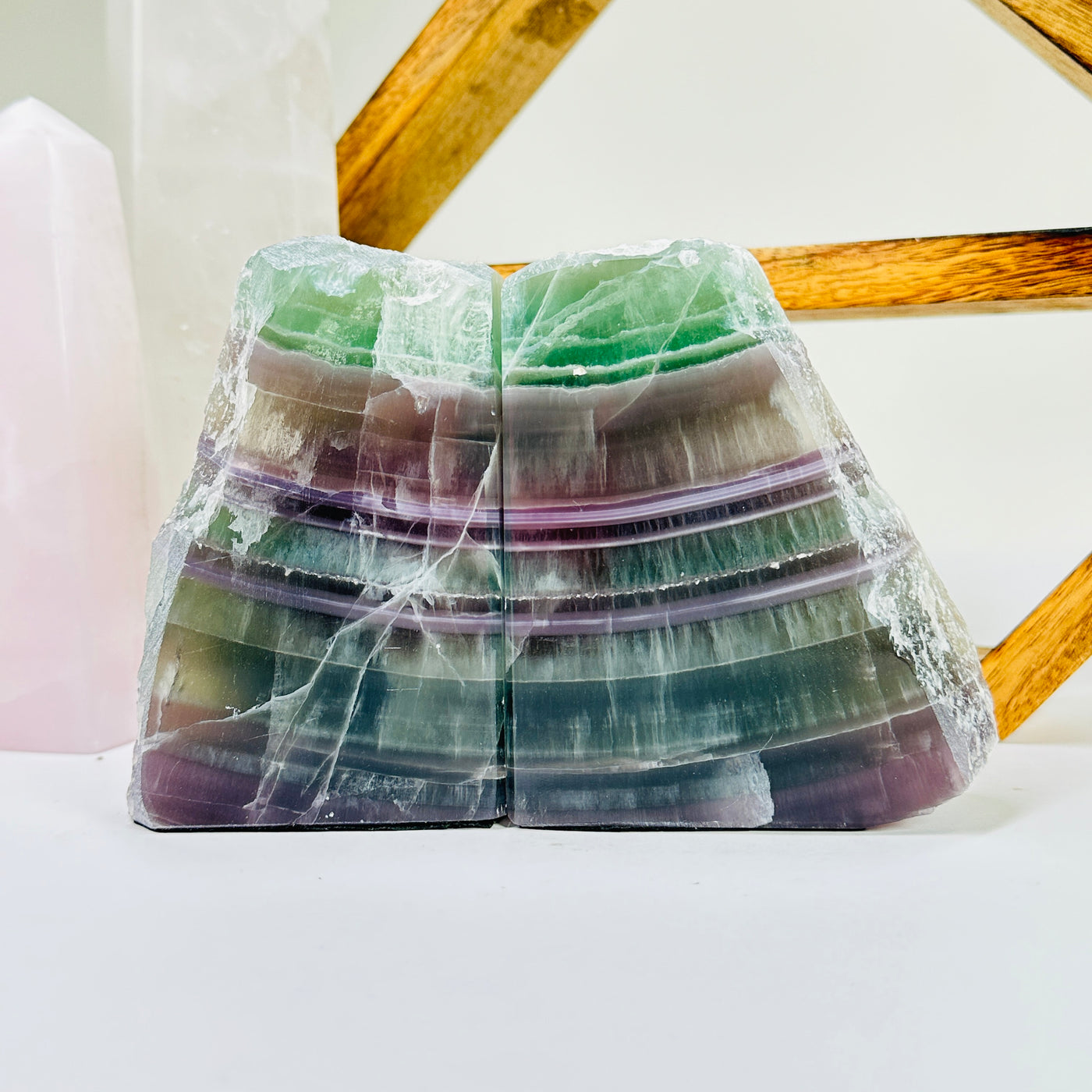 fluorite bookend with decorations in the background