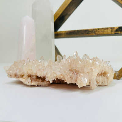 lemurian quartz with decorations in the background