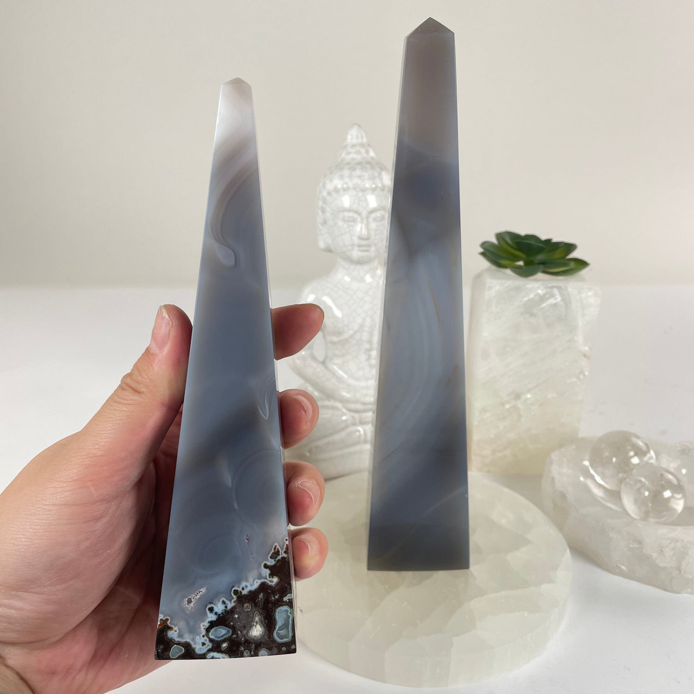 Agate Polished Crystal Obelisk - You Choose - one variant in hand with other variant in background