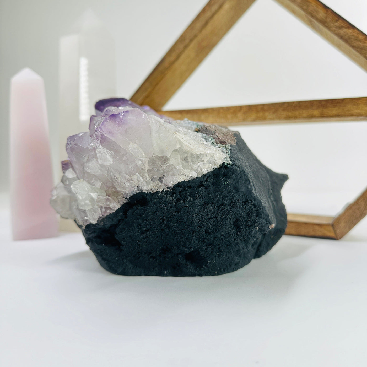 amethyst cut base with decorations in the background