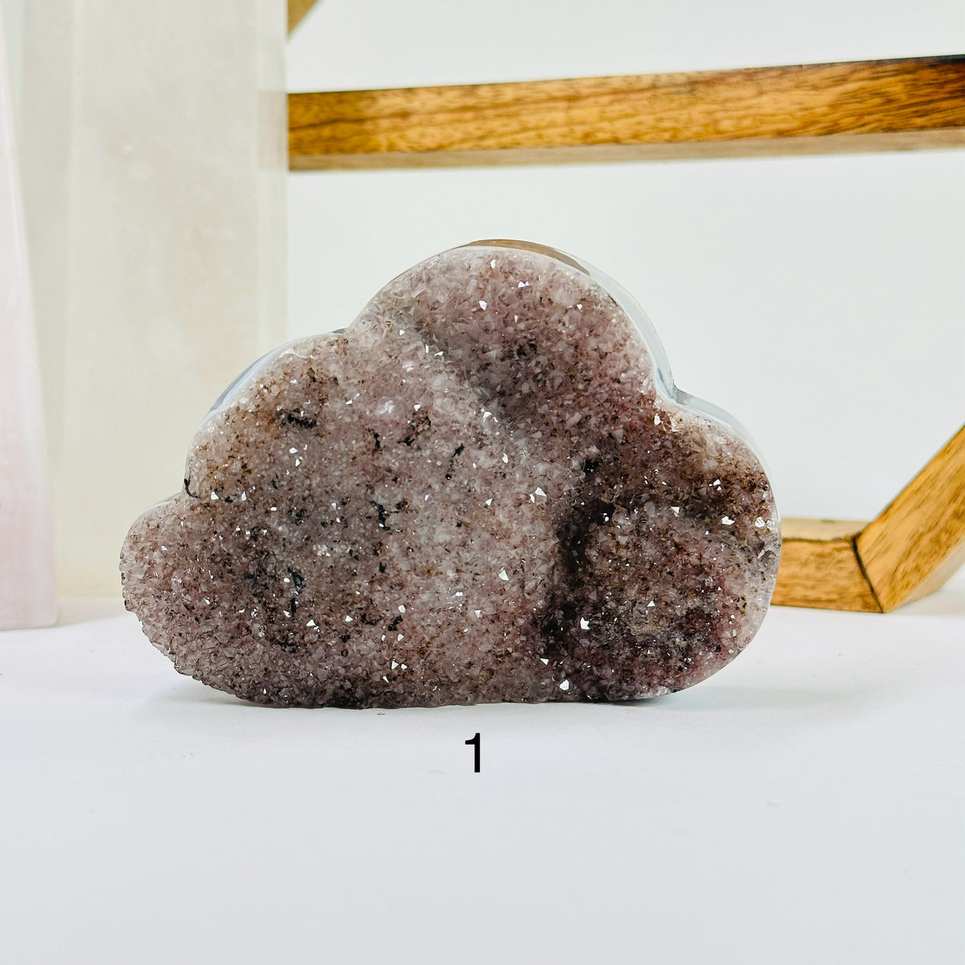 amethyst cloud with decorations in the background