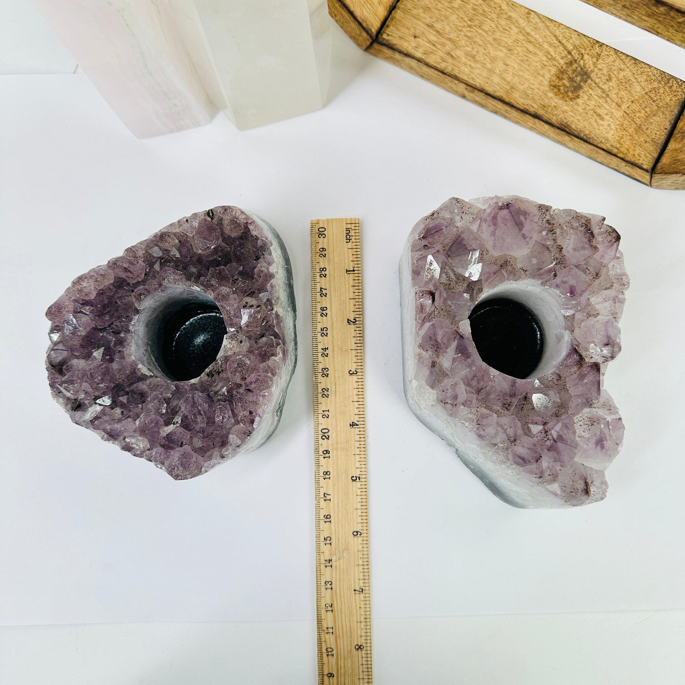 amethyst candle holders next to a ruler for size reference