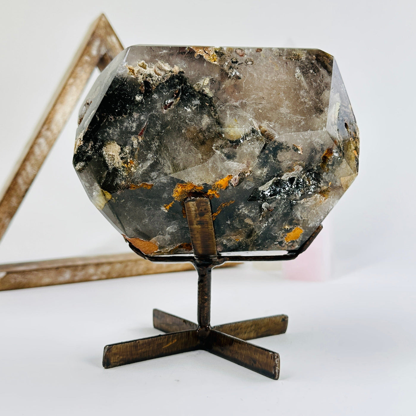 lodalite on metal stand with decorations in the background