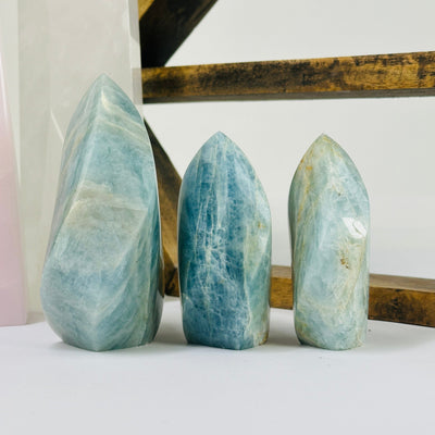 aquamarine points with decorations in the background