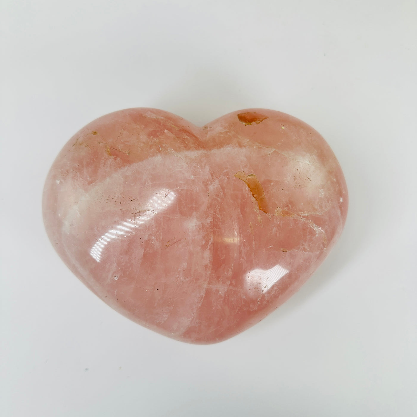 rose quartz with decorations in the background