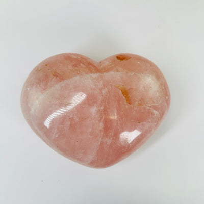 rose quartz with decorations in the background